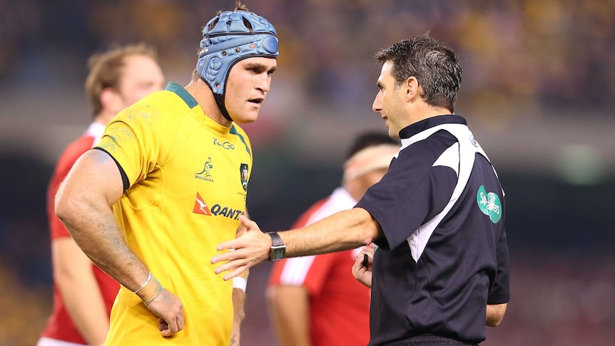 Wallabies skipper James Horwill seeks an explanation from referee Craig Joubert