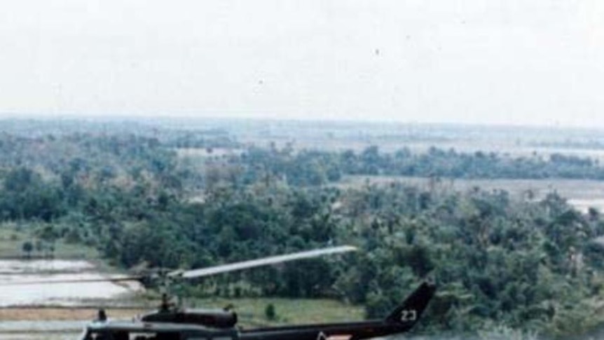 A US military helicopter sprays Agent Orange