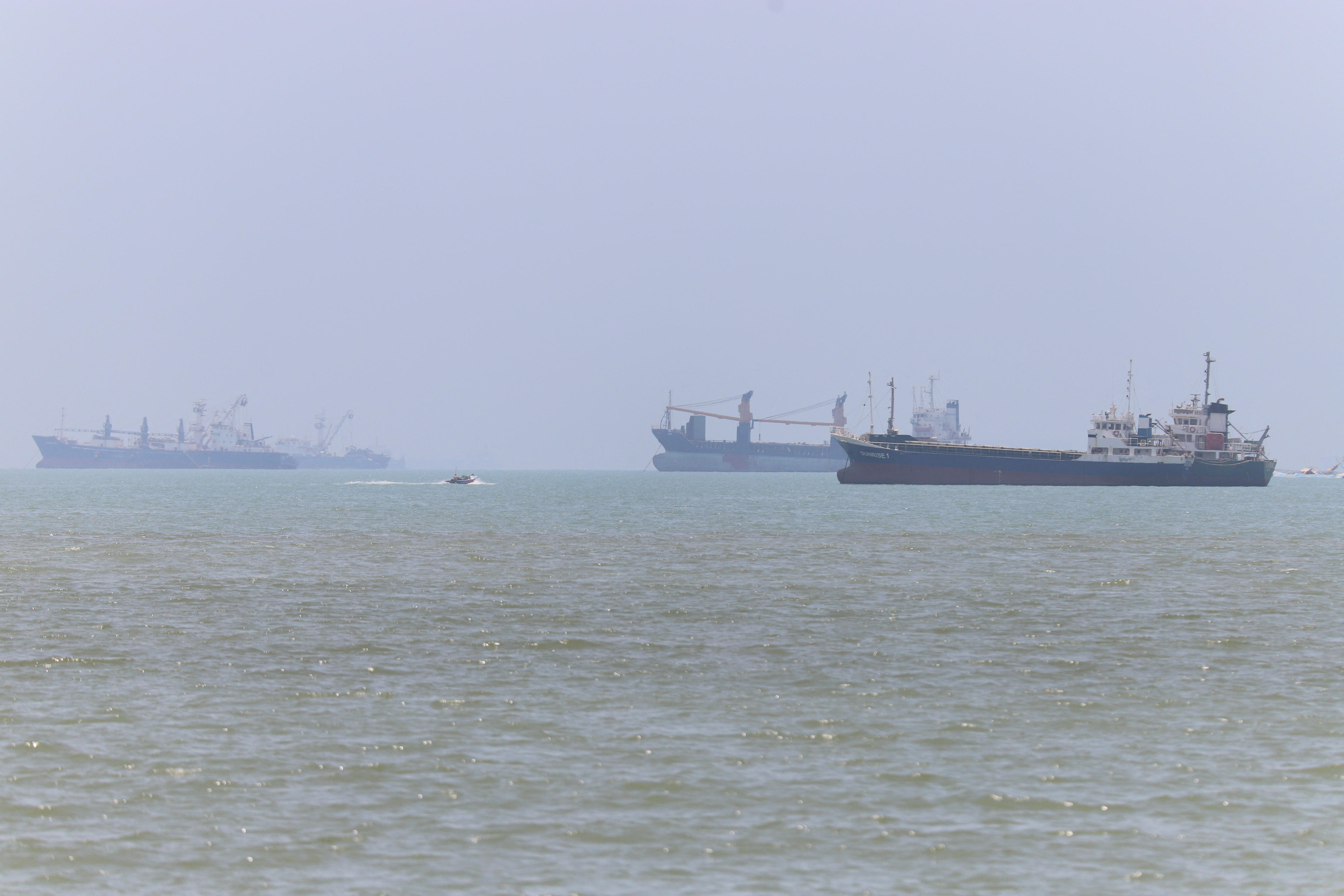 Oil flows through strait but Lebanon strikes raise peace doubts