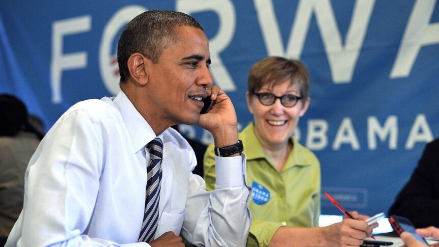 US president Barack Obama places a phone call