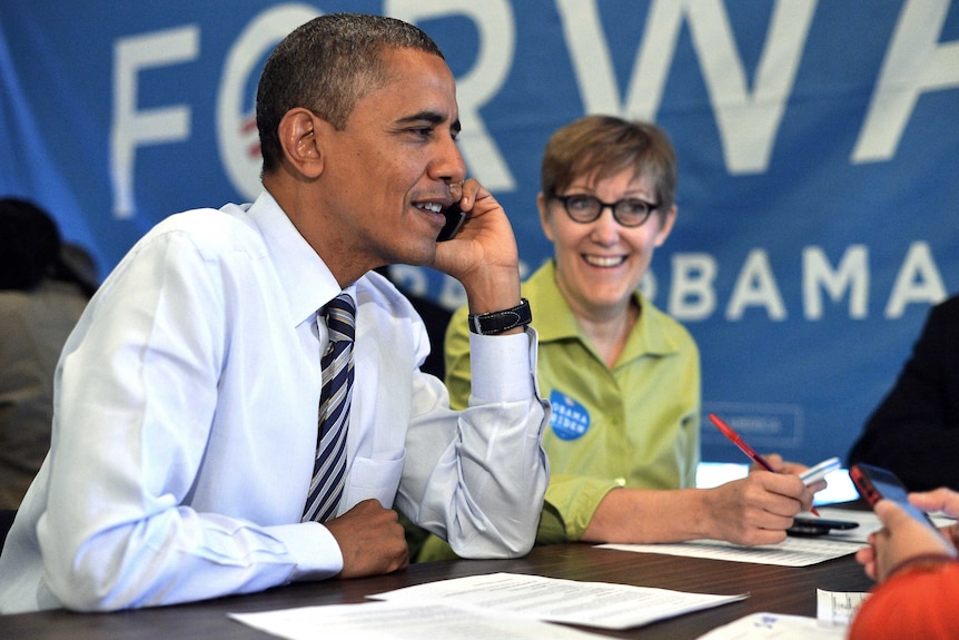 US president Barack Obama places a phone call