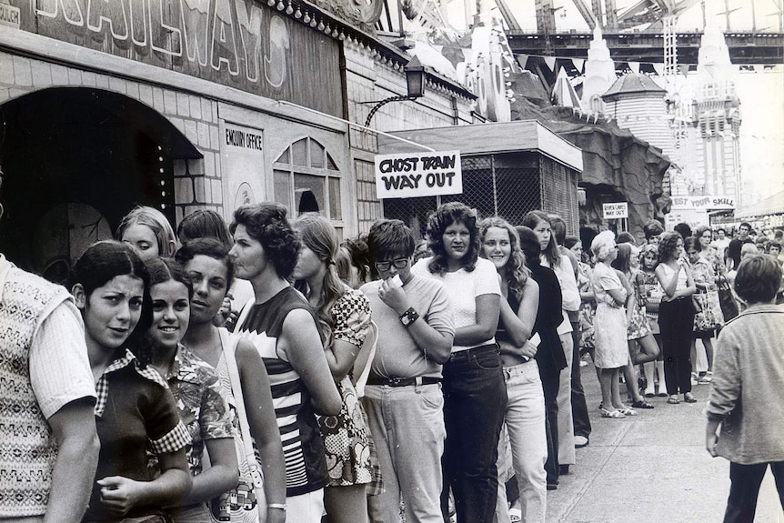 Passengers prepare for a ride on the Ghost Train