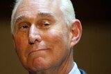 Roger Stone smiles at the camera