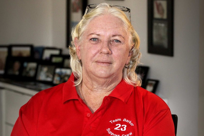 Betty Barker wears a red shirt