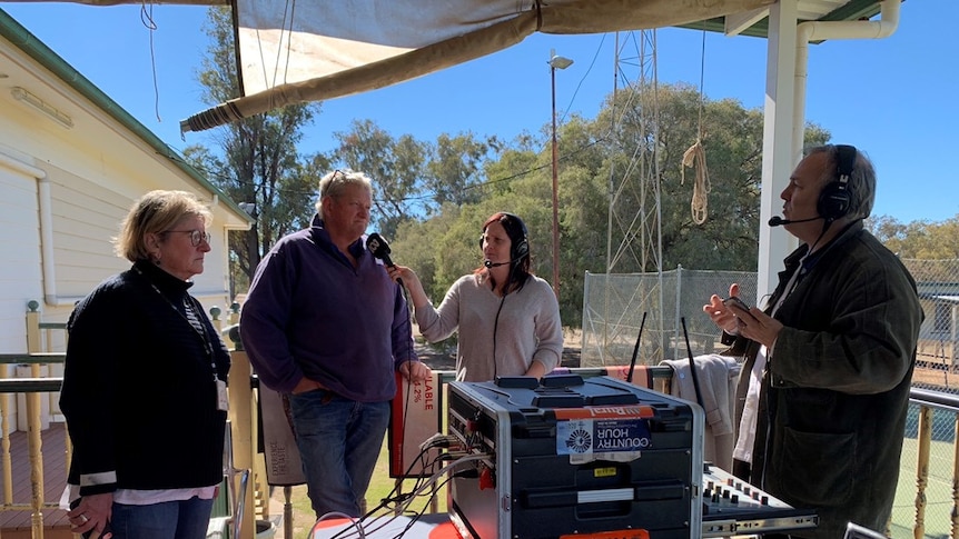 The NSW Country Hour team interviewing a farmer in Walgett