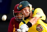 Shane Watson smashes the ball v West Indies in Gros Islet, St Lucia.
