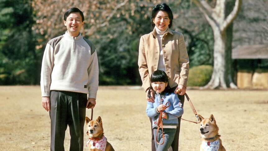 Crown Prince Naruhito with his wife, daughter and two dogs