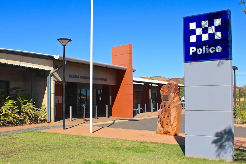 A small police station beneath a clear sky.