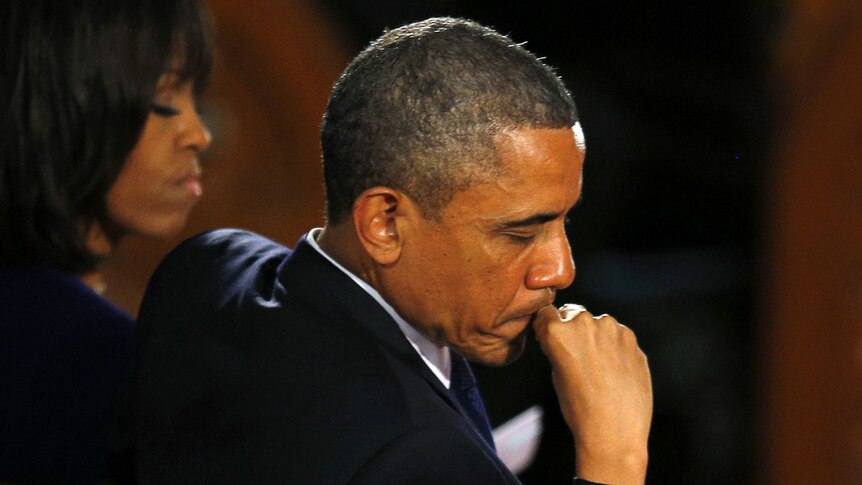 Barack and Michelle Obama at Boston memorial service