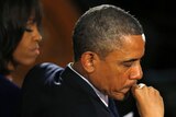 Barack and Michelle Obama at Boston memorial service