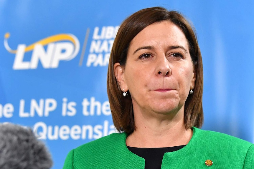 Queensland LNP Leader Deb Frecklington tightly purses her lips during a press conference in Brisbane.
