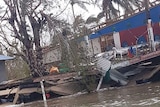 Houses destroyed by high winds and flooding from caused by Tropical Cyclone Gita