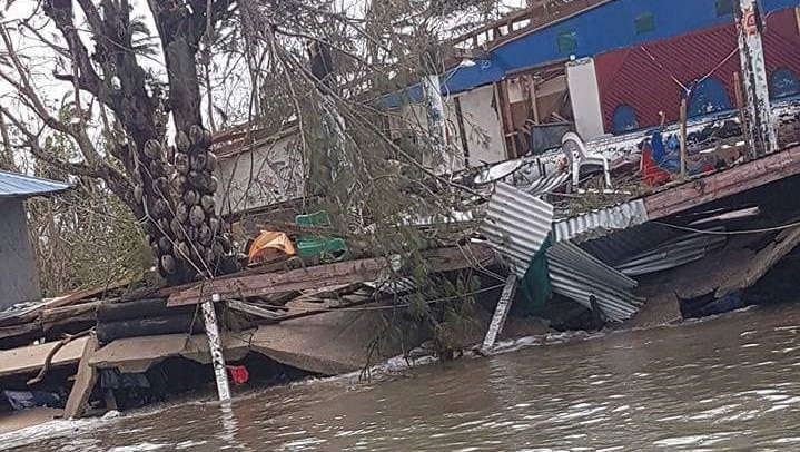 Houses destroyed by high winds and flooding from caused by Tropical Cyclone Gita