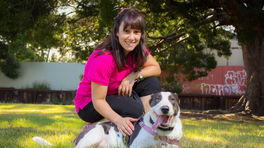 Eve McKenzie with a dog