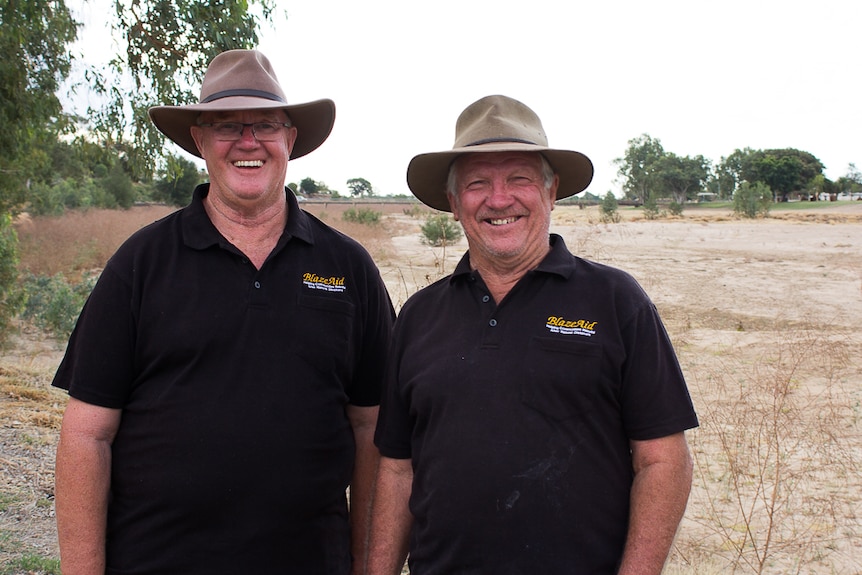 Two smiling BlazeAid volunteers