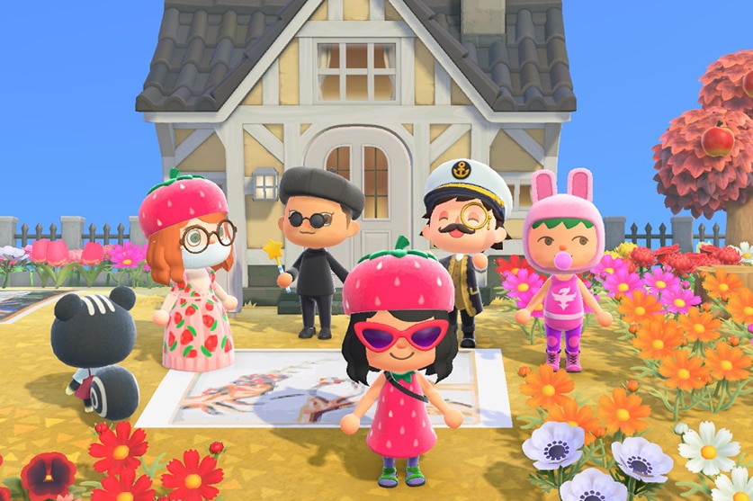 Six 3D characters in fun outfits stand in front of yellow and white country house with flower garden and apple tree.