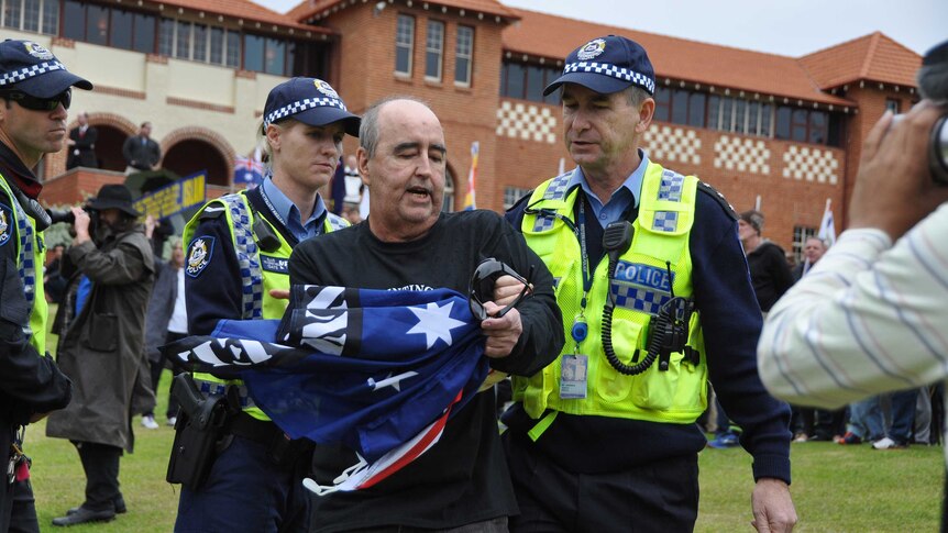 Reclaim protester escorted by police in Perth