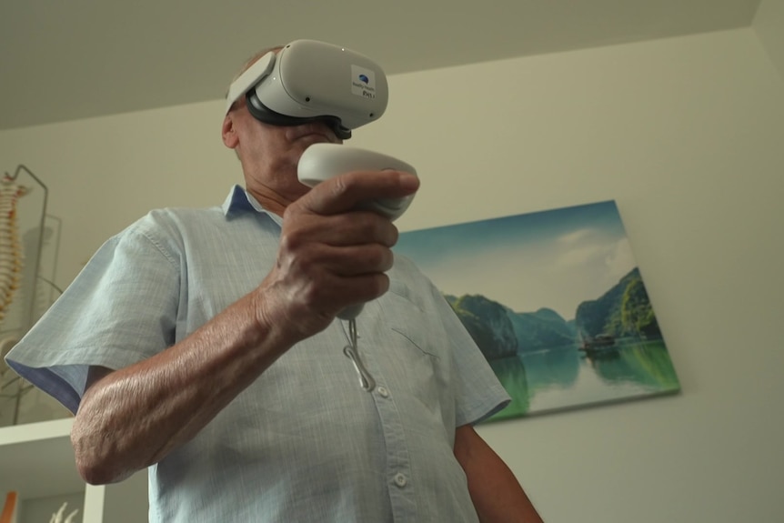 A chronic pain patient wears a virtual reality headset.