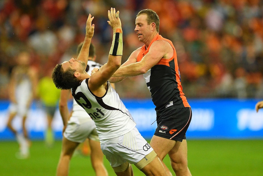 Steve Johnson pushes Luke Hodge