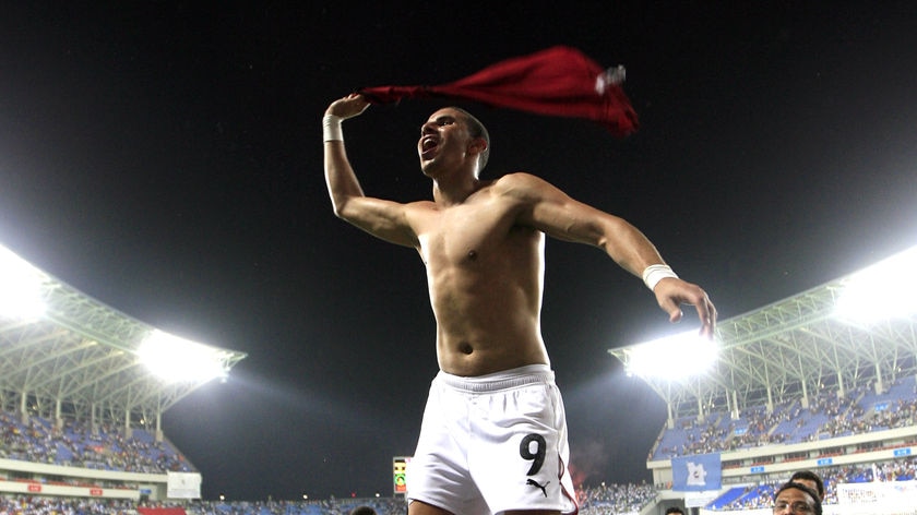 Mohamed Zidan celebrates after Egypt's victory over Algeria