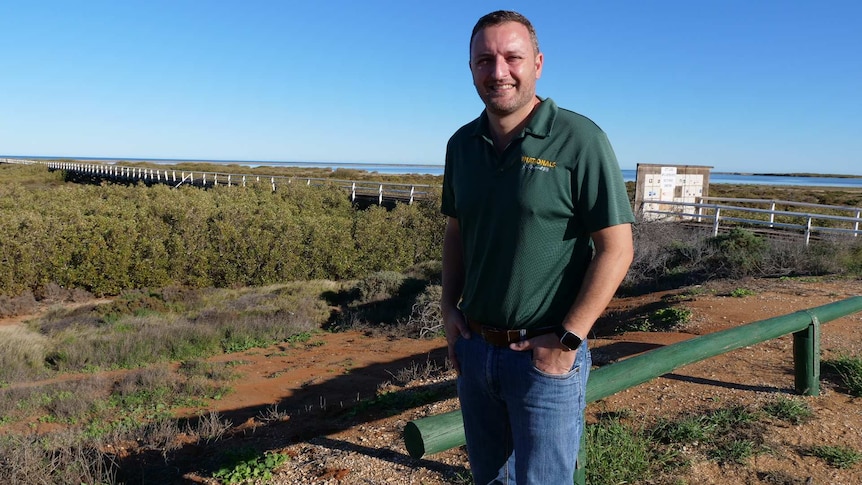 Man standing in front of Carnarvon's One Mile Jetty