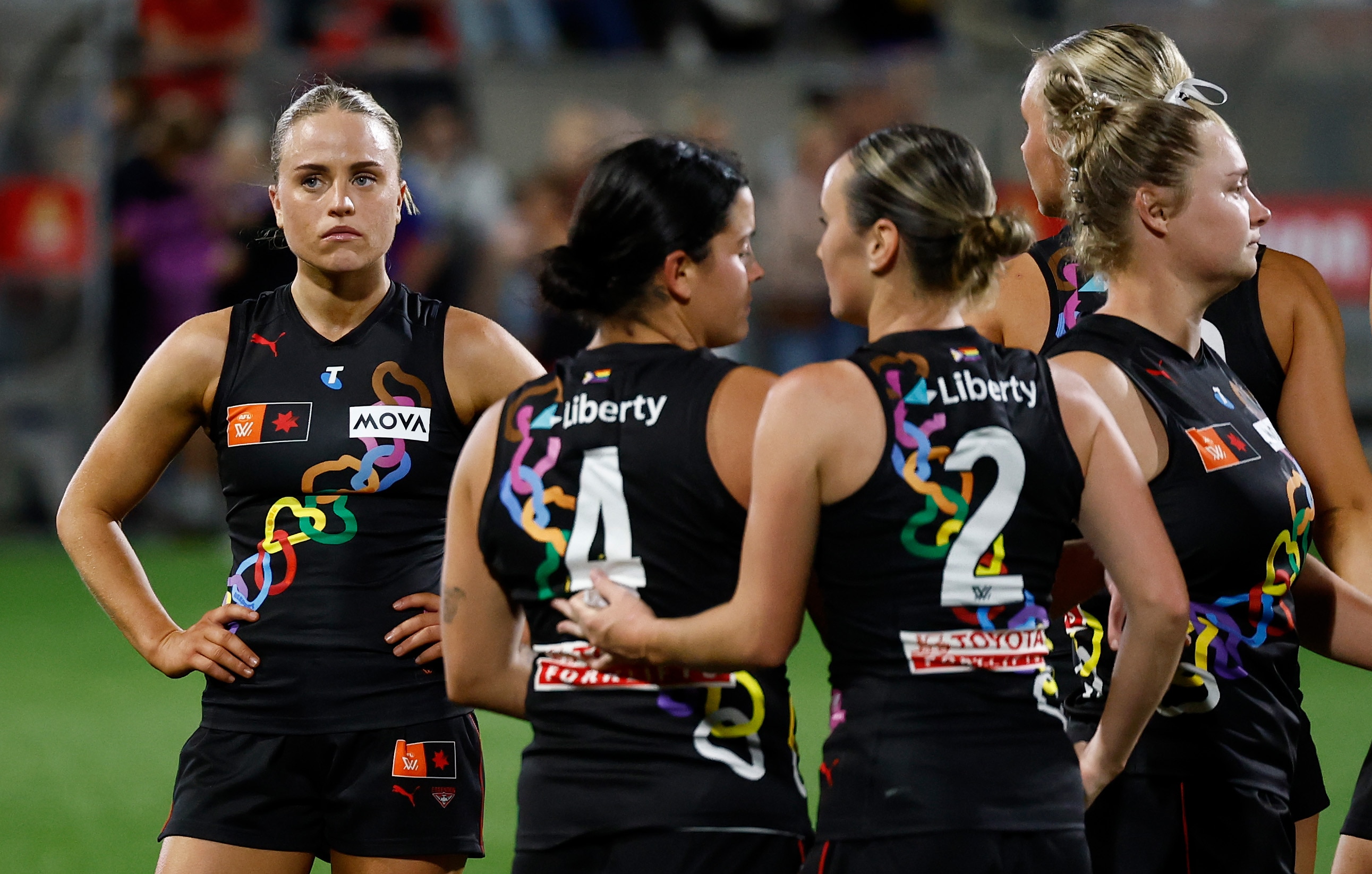 Mia Busch of the Bombers looks dejected after a loss.