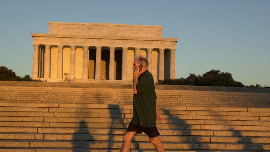 John Howard walks past the Lincoln Memorial