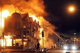 Firemen battle blaze during riots in Croydon, south London