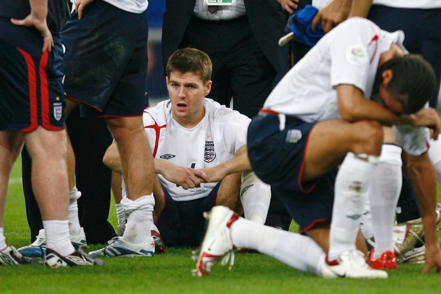 Steven Gerrard (C) shows his dejection after England was knocked out of the 2006 World Cup.