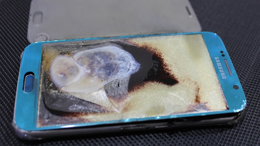 close up photo of a smartphone with melted screen and body of phone exploded apart