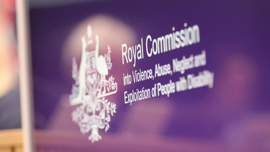 The logo of the disability royal commission is seen on a purple background.