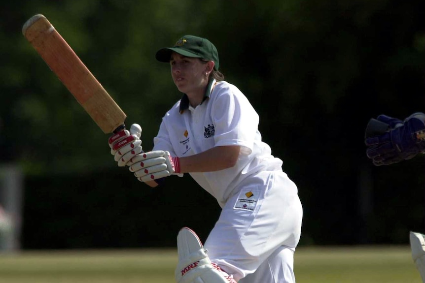 Michelle Gozco plays a shot at the crease.