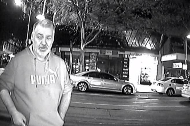 CCTV image of a man who threatened a taxi driver with a knife