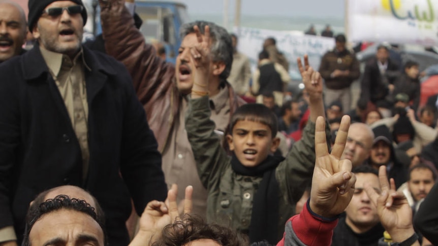 Libya unrest: Anti-Gaddafi protesters chant slogans during a protest in Benghazi