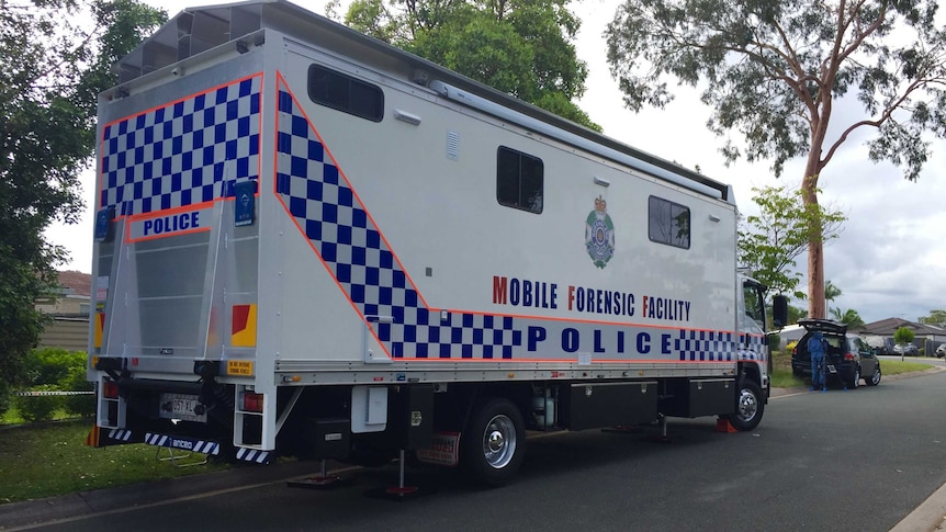 Forensic truck and police outside a house at Melnik Drive at Loganlea, south of Brisbane.
