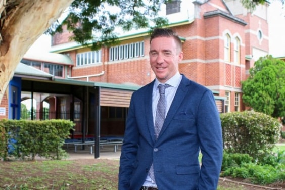 A man in a suit.