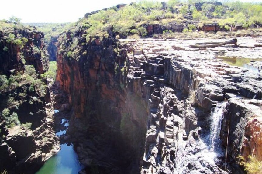 A shot of the sandstone rocks and blue pools of Mitchell Falls in the Kimberley.