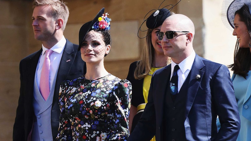Charlotte Riley and Tom Hardy arrive for the wedding ceremony of Prince Harry and Meghan Markle.