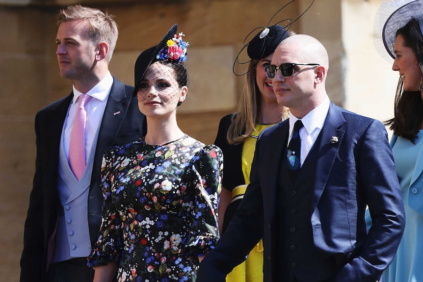 Charlotte Riley and Tom Hardy arrive for the wedding ceremony of Prince Harry and Meghan Markle.