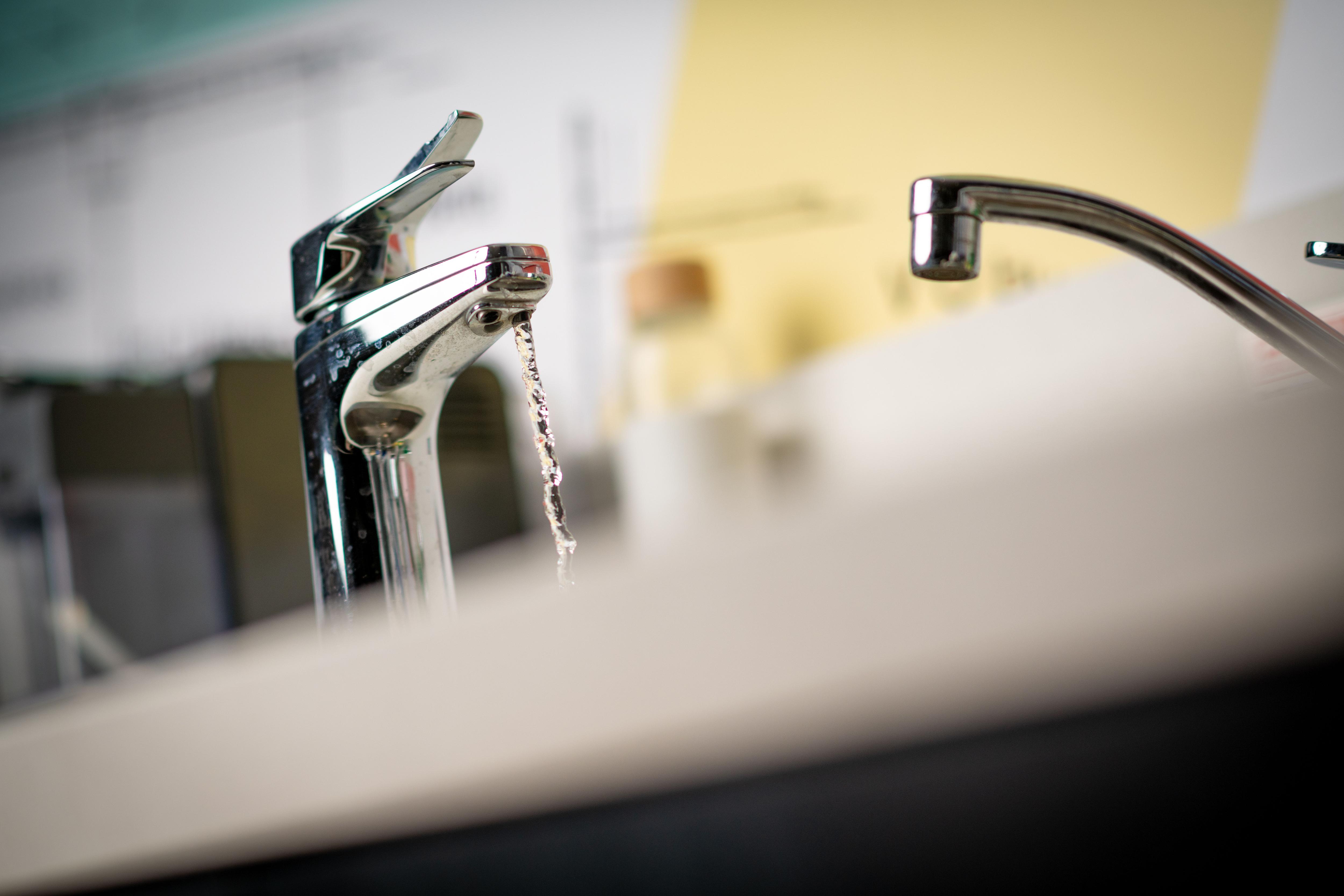 Water coming out of a tap 