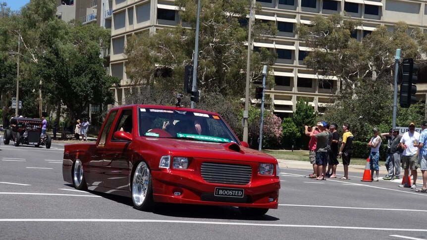 Car with 'boosted' numberplate taking part in the Summernats Citycruise in Canberra.