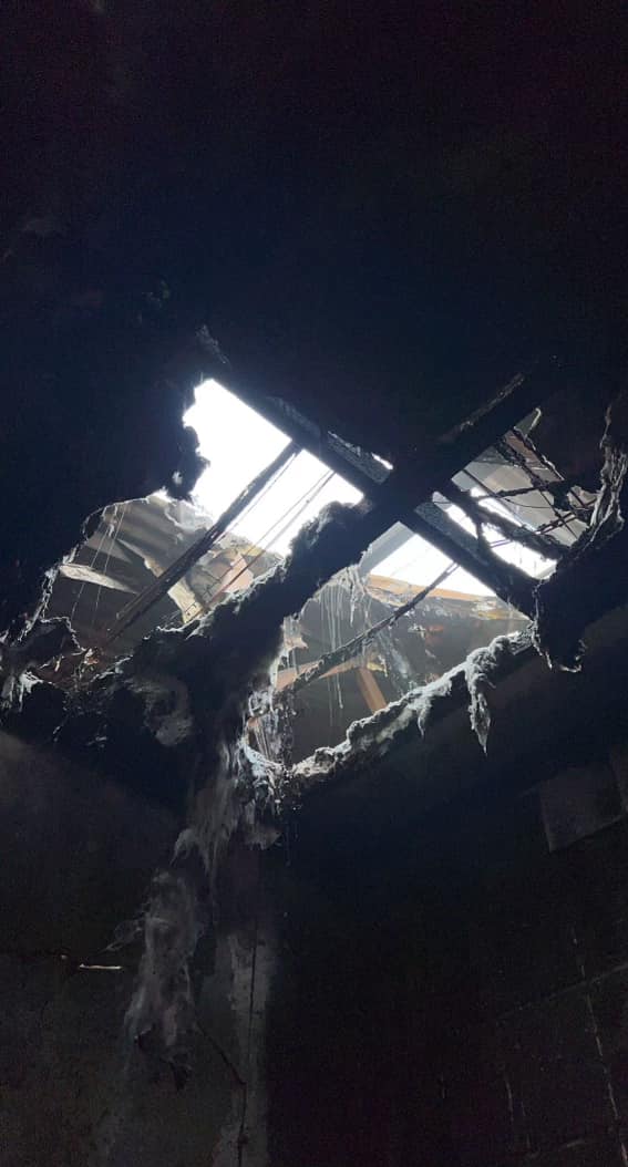 A fire-damaged ceiling