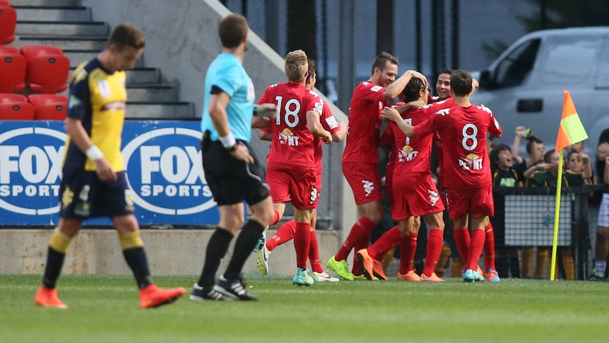 Adelaide celebrates Cirio's first goal