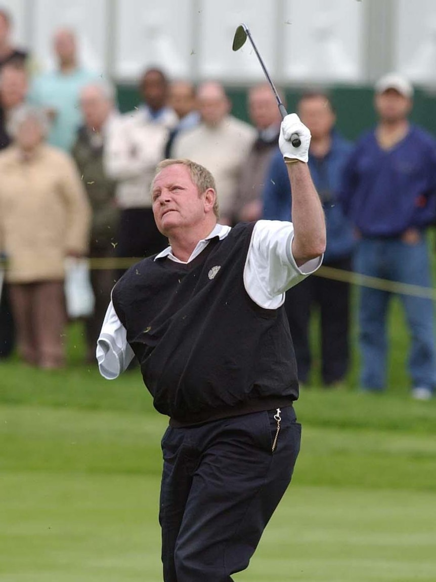 A male golfer with one arm hits a ball during a tournament