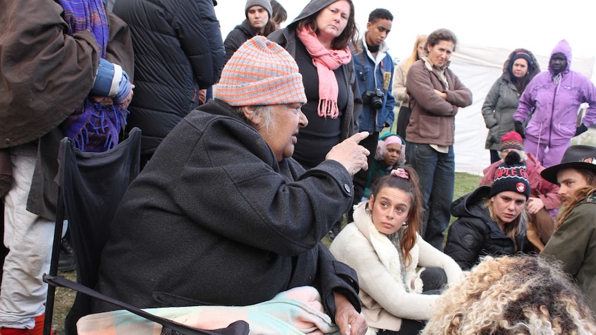Elder Aunty Sandra Onus speaks to a group at the site of protests against the Western Highway duplication project.