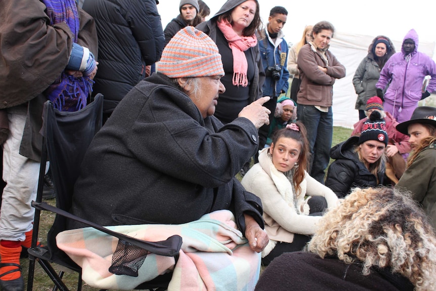 Elder Aunty Sandra Onus speaks to a group at the site of protests against the Western Highway duplication project.