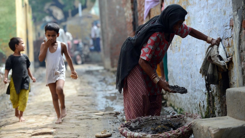 Woman manual scavenging