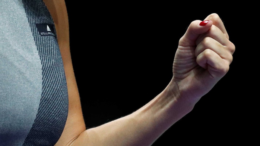 Denmark's Caroline Wozniacki pumps her fist during her match.