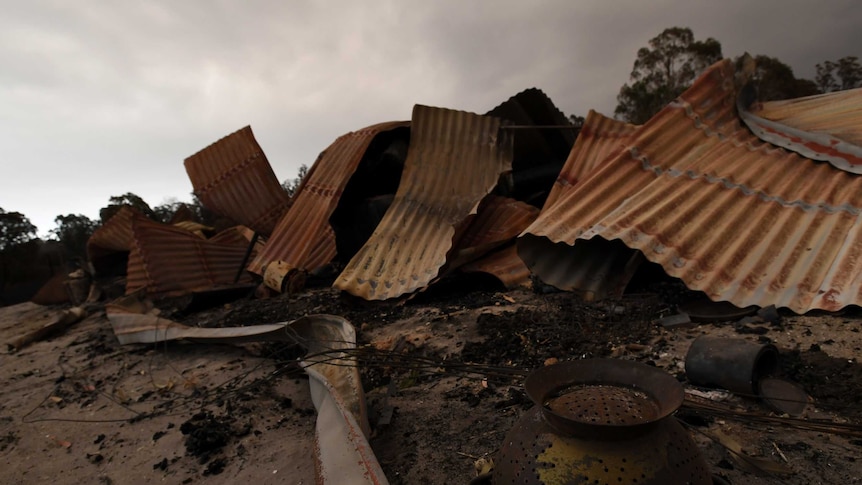 Twisted sheets of burnt metal are all that remain of a property at Bruthen South.