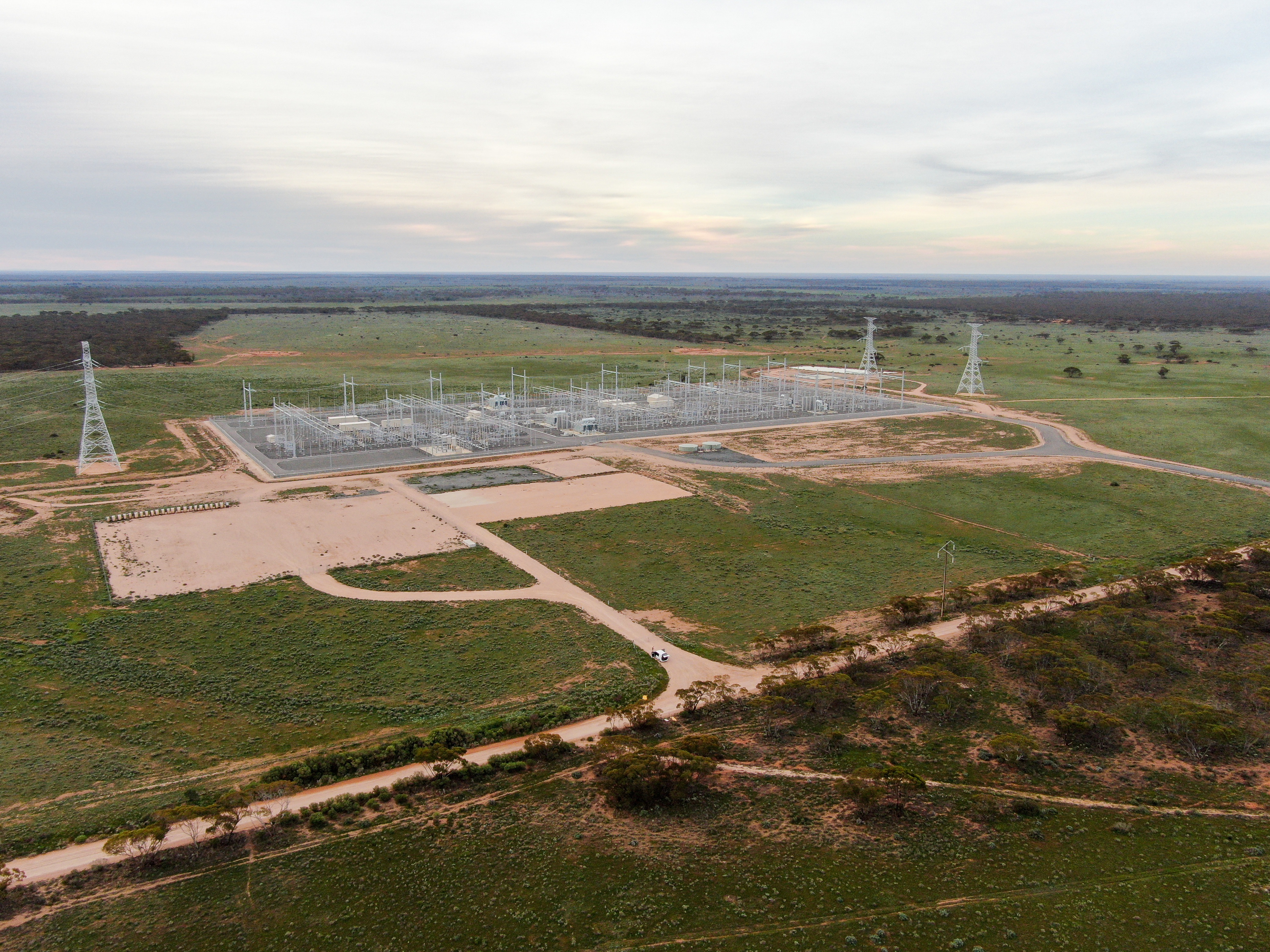 A large substation featuring numerous electricity towers and power lines in regional South Australia.
